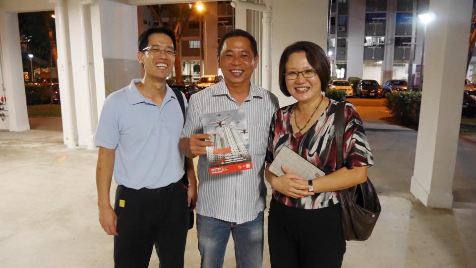 Former NCMP Gerald Giam and WP Chairman Sylvia Lim with a resident