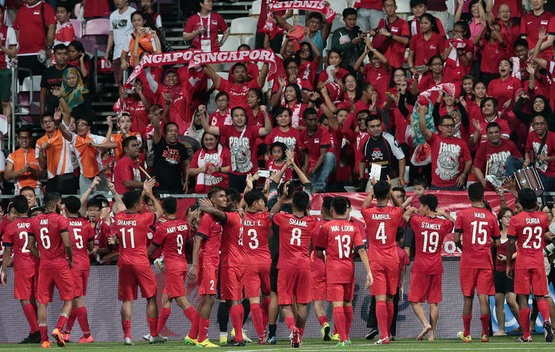 28th SEA Games Singapore 2015 - Jalan Besar Stadium, Singapore - 01/06/15 Football - Singapore v Philippines - First Round - Soccer - Singapore celebrates winning the match with their fans after the match TEAMSINGAPORE SEAGAMES28 Mandatory Credit: Singapore SEA Games Organising Committee / Action Images via Reuters