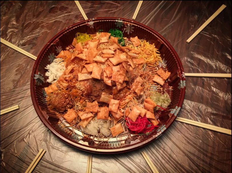 It's the new normal -- lo hei without shouting the usual auspicious phrases