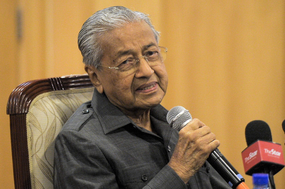 after-apologising,-dr-mahathir-says-ready-to-accept-punishment-for-sop-breach-during-langkawi-event