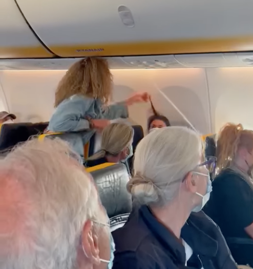 Woman refuses to wear mask in flight, pulls another passenger’s hair, later dragged off plane