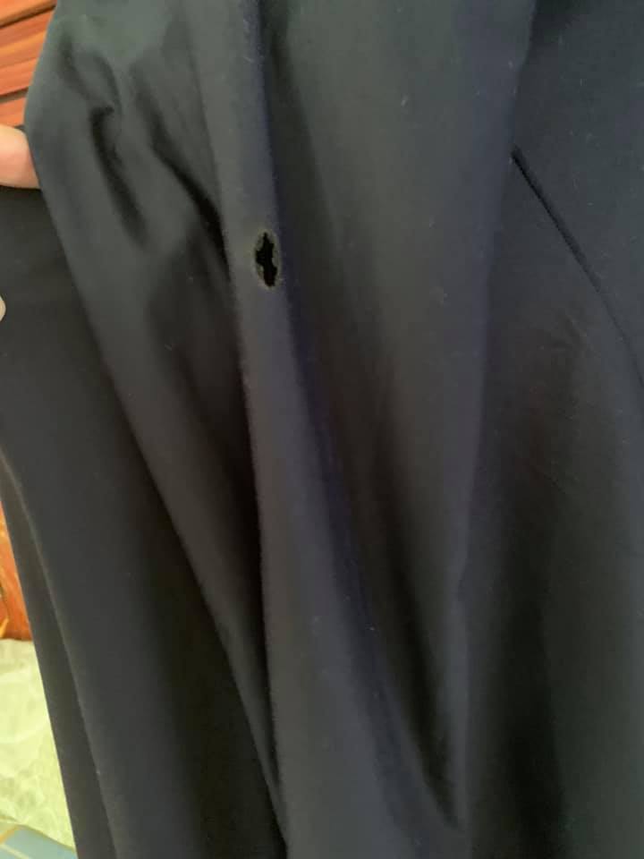 Inconsiderate neighbour carelessly throws cigarette which burns a hole in other's laundry