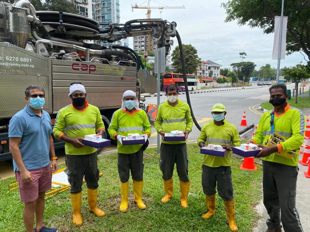 Migrant workers receive gifts of Bluetooth headphones from Singaporeans in the spirit of Xmas sharing & giving