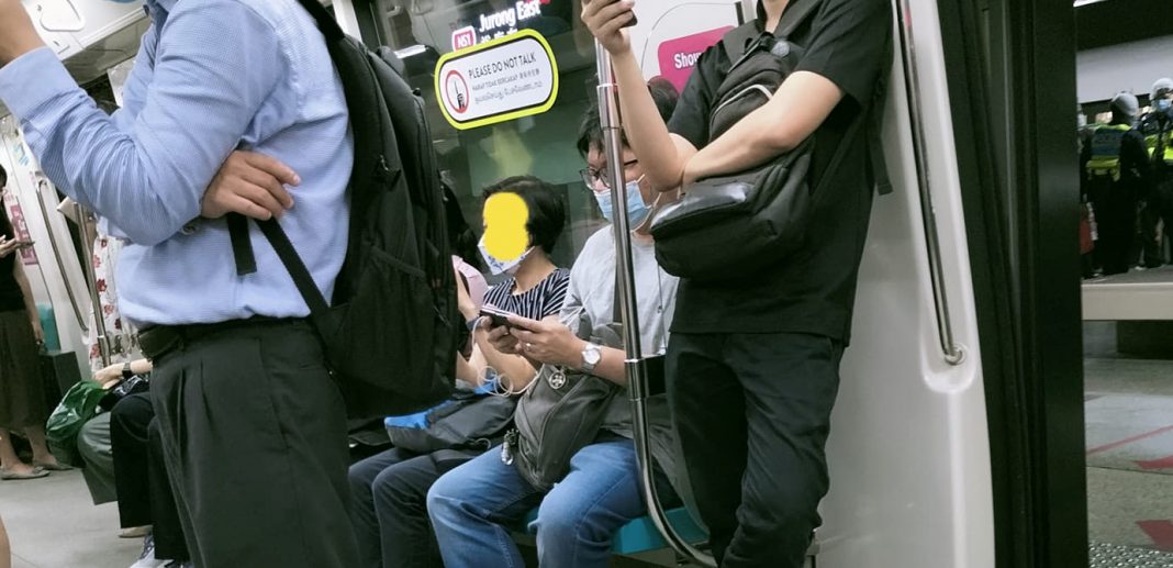 commuter-moves-away-to-another-seat-after-indian-man-seats-next-to-her,-sparks-intense-exchange-on-casual-racism