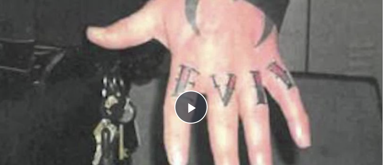 a-cop-got-fired-after-getting-the-phrase-“pure-evil”-tattooed-on-his-knuckles