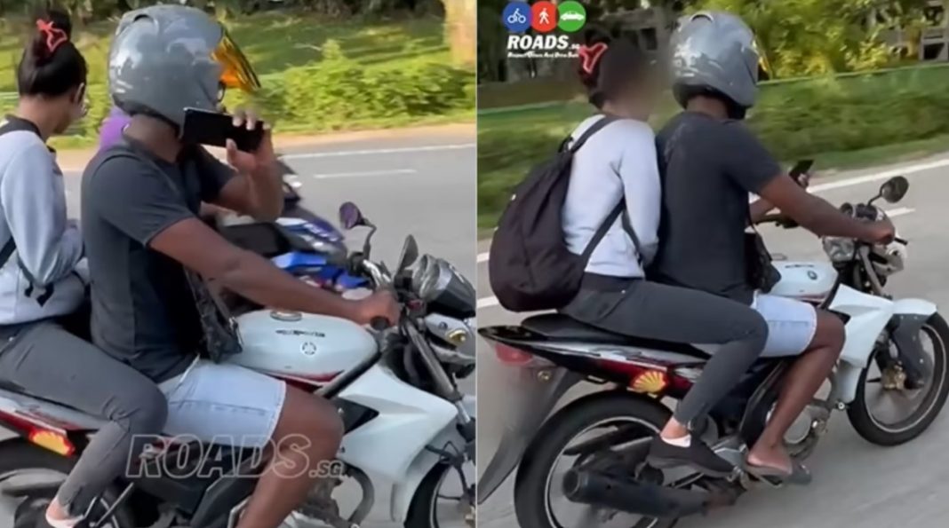 Video of motorcyclist using his phone while ferrying helmetless pillion ...