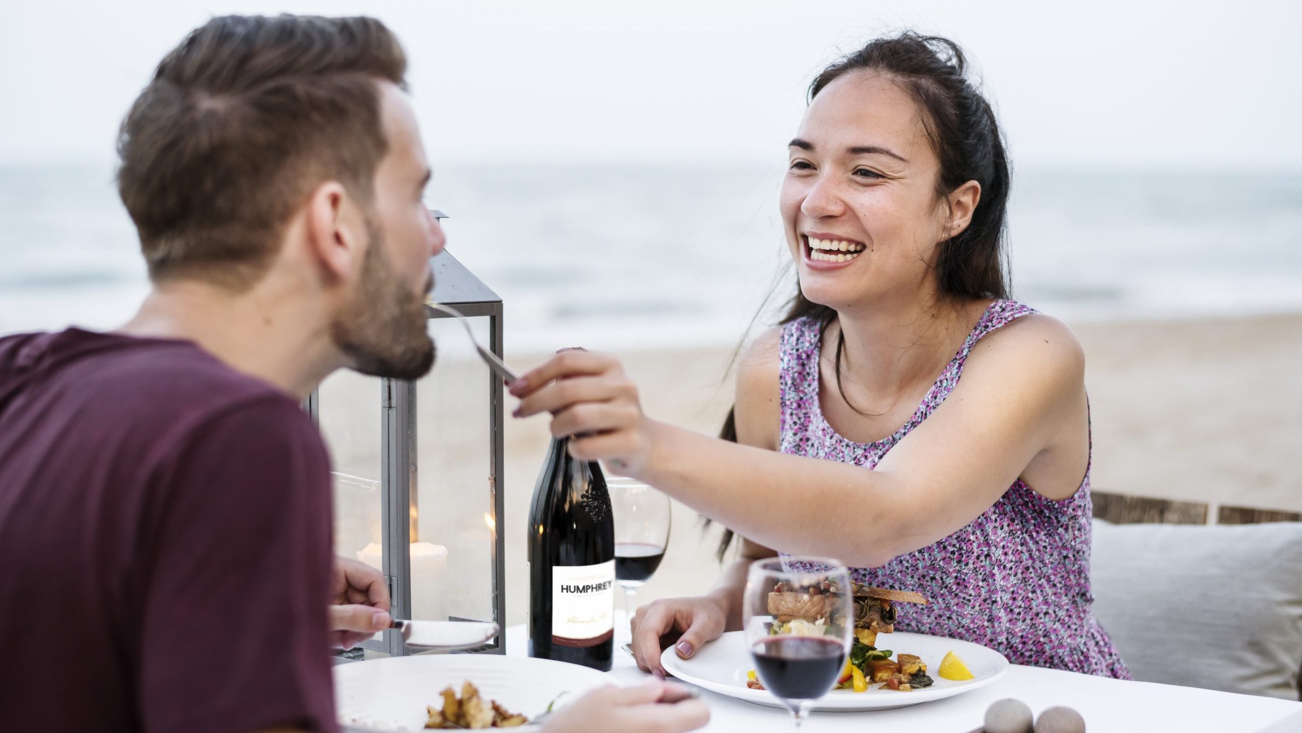 Couple dining at the beach