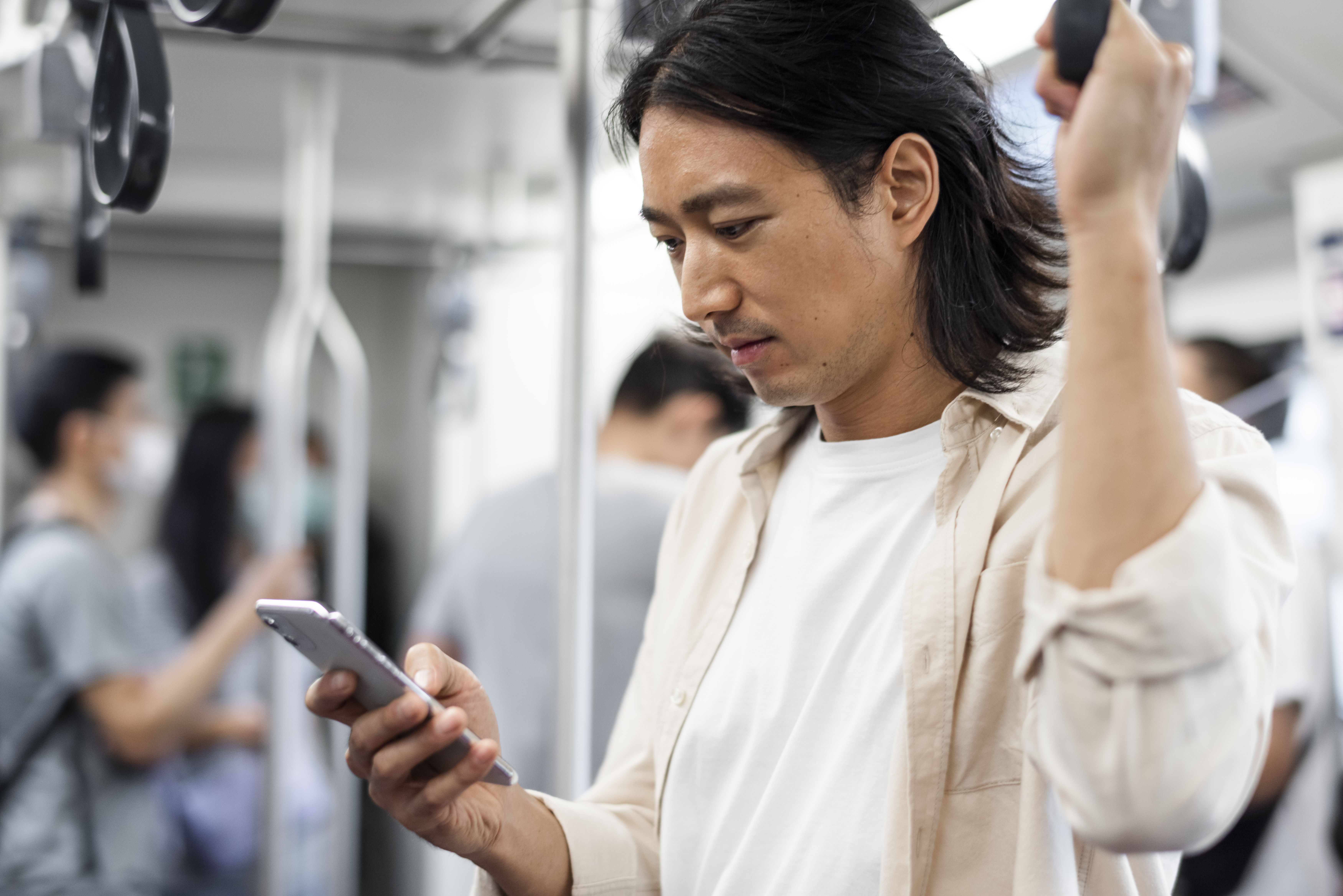 Is it safe to ask SG people on MRT to turn down the volume of their mobile phone videos/music/games?