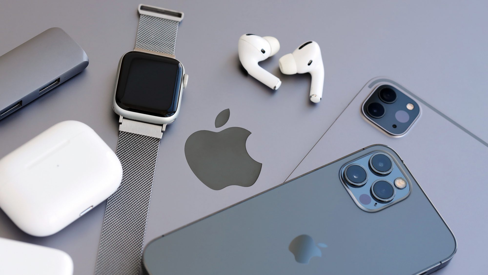 Apple brand devices iphone, ipad and airpods with apple watch