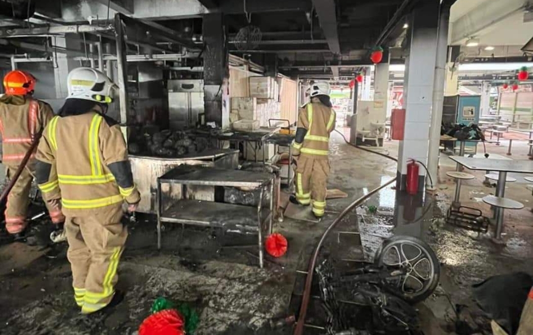 3 Jalan Redhill stalls badly burned after nearby e-bike catches fire