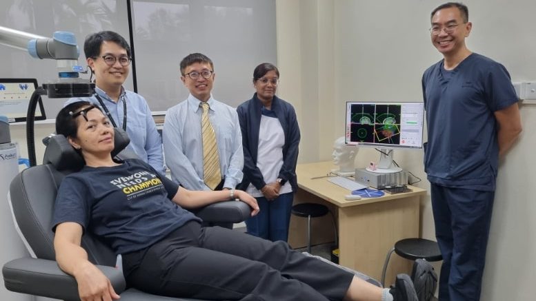 [From left to right] Nurse Loida G Sawit, Dr Jonathan Lee, Consultant in the Department of Mood & Anxiety at the Institute of Mental Health (IMH), Associate Professor Thomas Yeo, Deputy Director of the Centre for Translational Magnetic Resonance at NUS Medicine, Nurse Geeta Kasinathan and Dr Tor Phern Chern, Senior Consultant in the Department of Mood & Anxiety and Head of Neurostimulation Service at IMH demonstrating how personalised Transcranial Magnetic Stimulation is applied on patients with treatment-resistant depression.