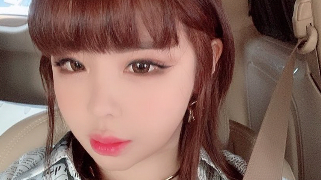 In light of the Park Bom scandal, CL shares a 2NE1 group video