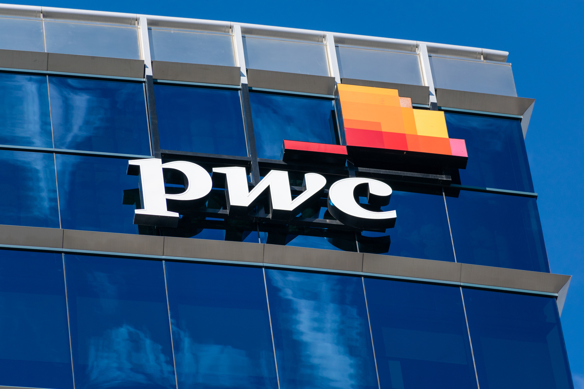 PwC sign is seen at company office in the downtown of Silicon Valley largest city.