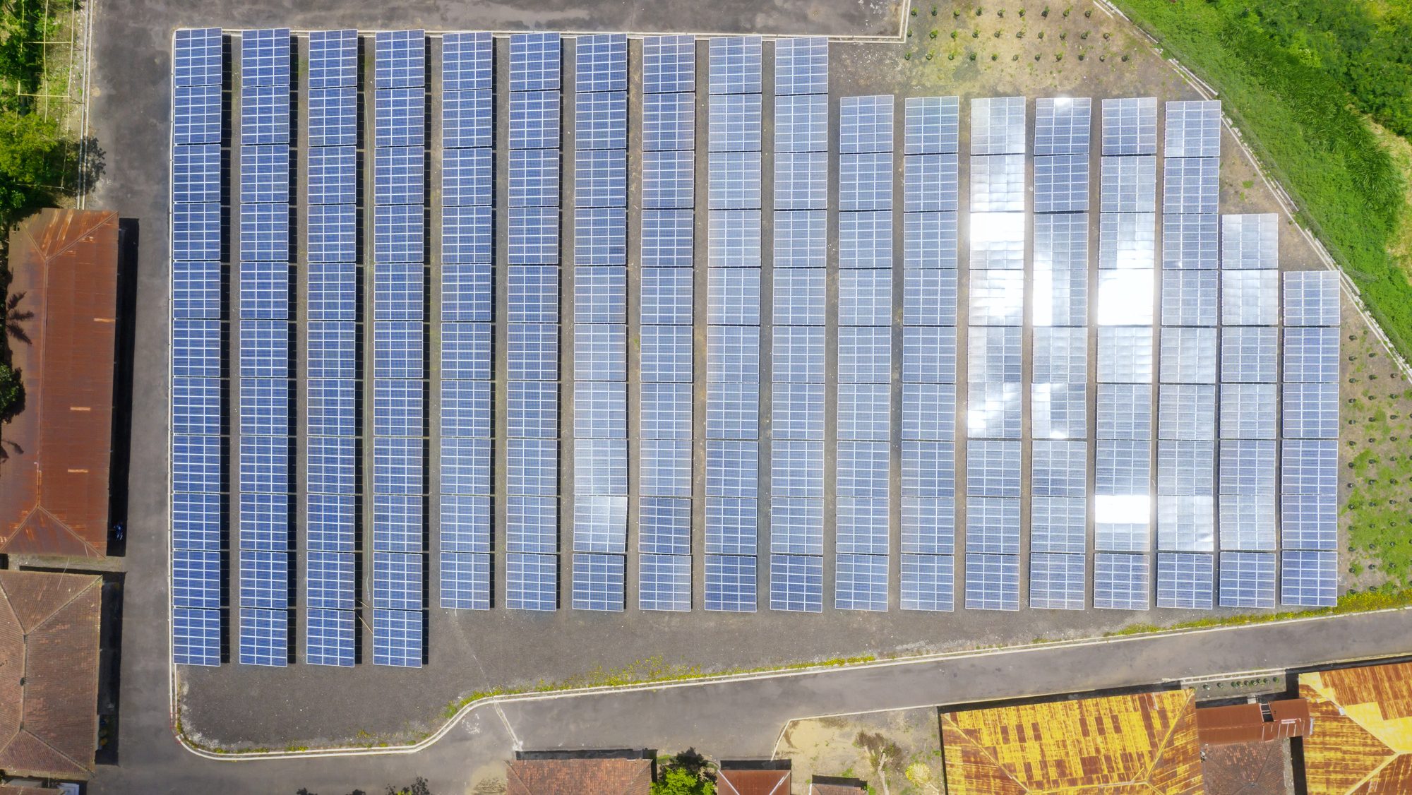 Top down view of rows of solar panels for renewable energy resources in Bali, Indonesia