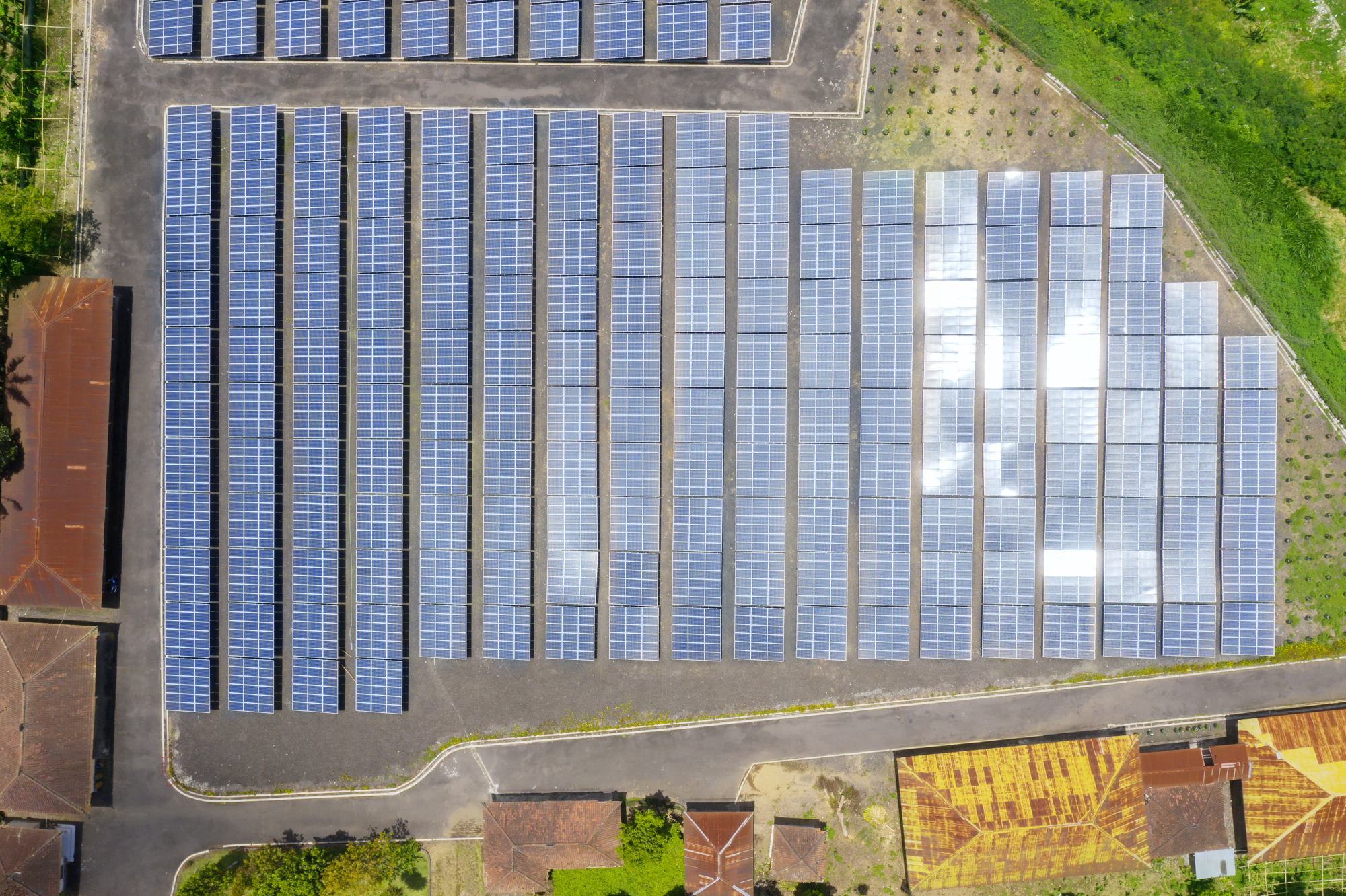 Top down view of rows of solar panels for renewable energy resources in Bali, Indonesia