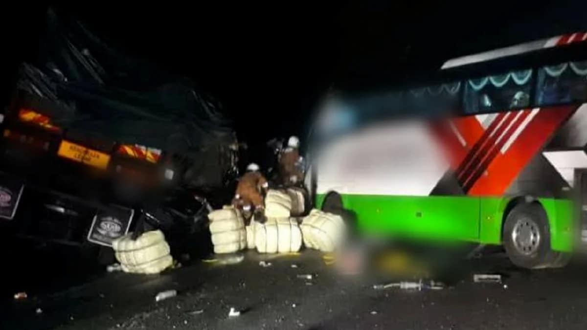 Collision of a tour bus carrying 27 passengers, a trailer, and a Toyota Estima MPV