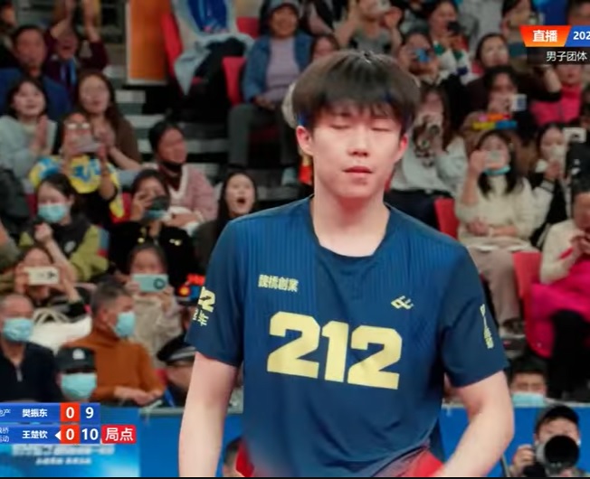 Fury erupts after Chinese table tennis star Wang Chuqin is told to move aside on stage at Coca-Cola event