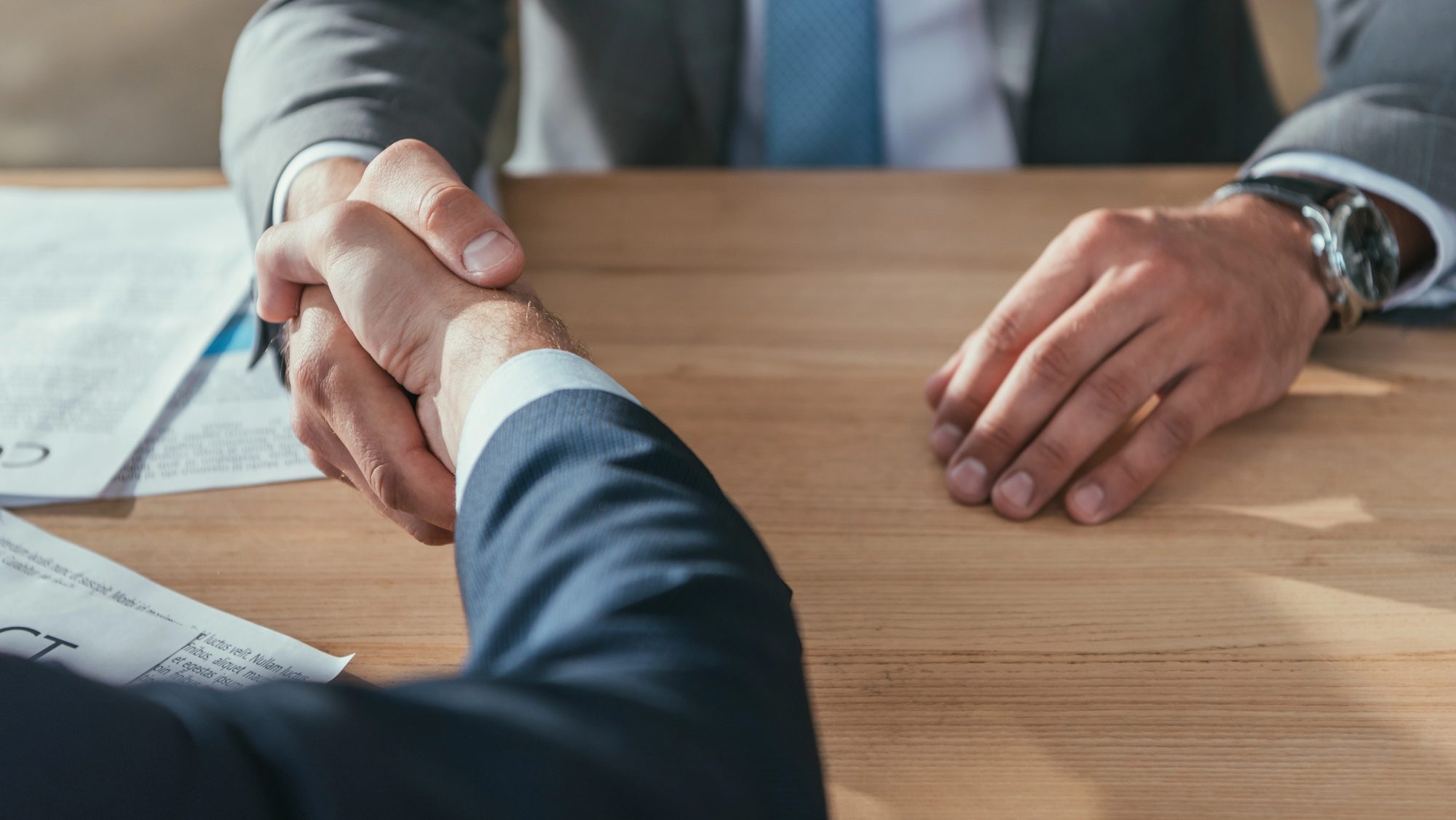 Business partners shaking hands