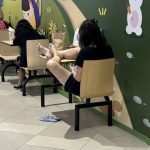 Woman draws flak for getting “super comfortable” with her bare feet up on a table at Tampines Hub