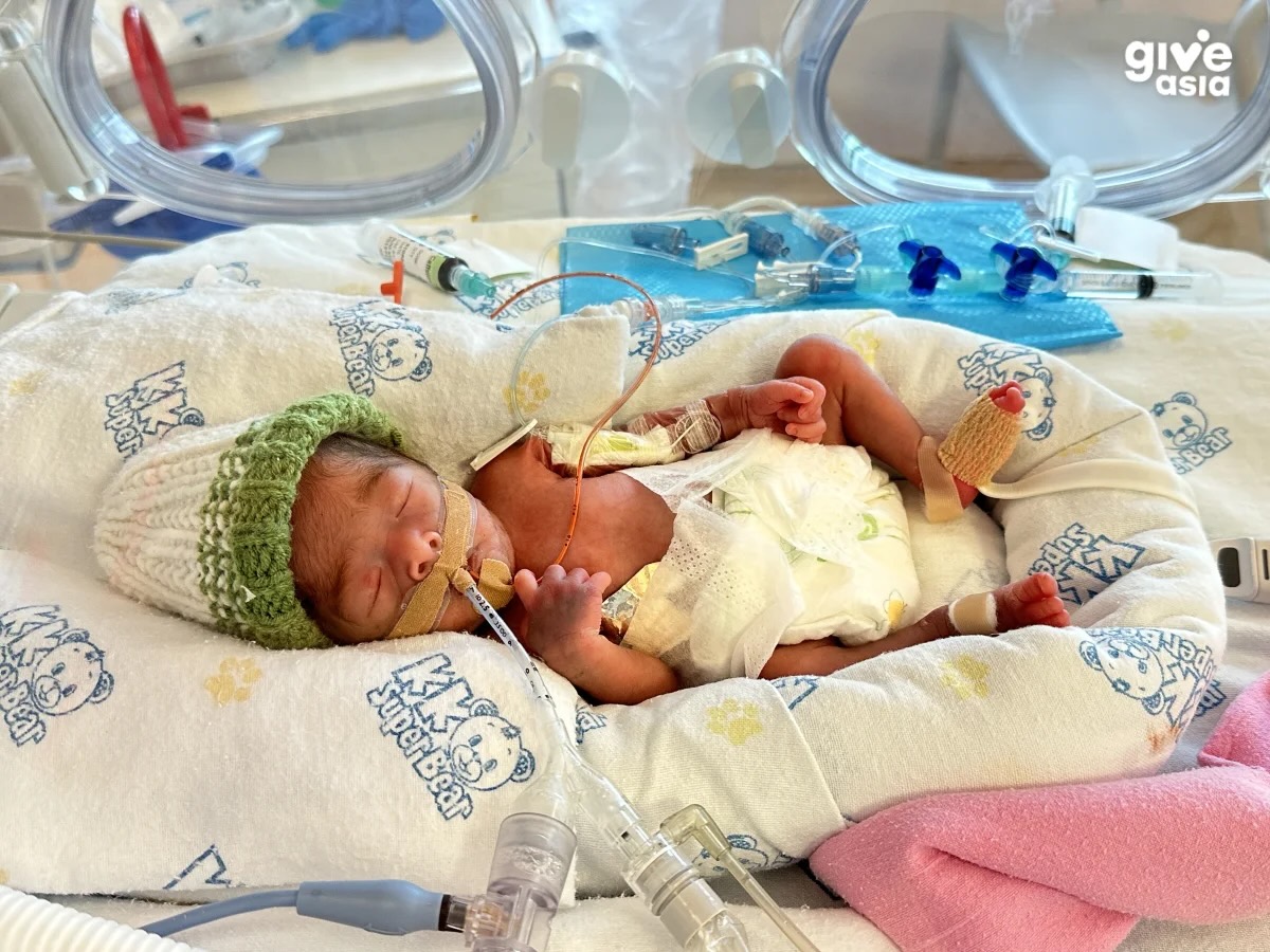 Baby born at 28 weeks, weighing less than a bag of rice, fights for her life at KKH
