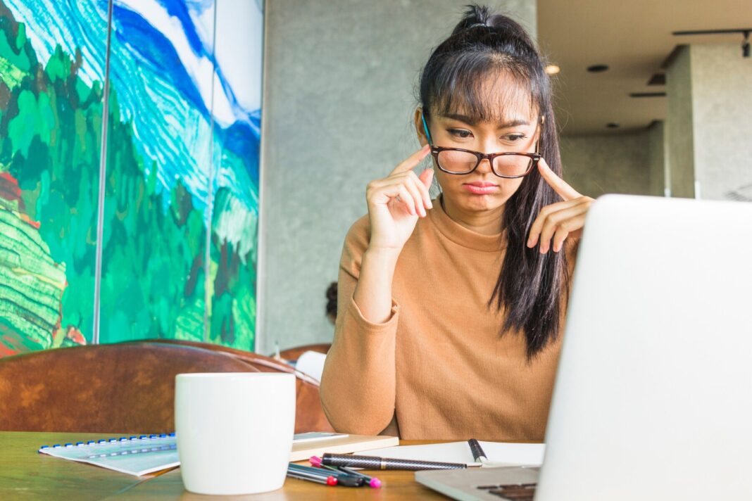 sad-lady-with-laptop-table_23-2147953164
