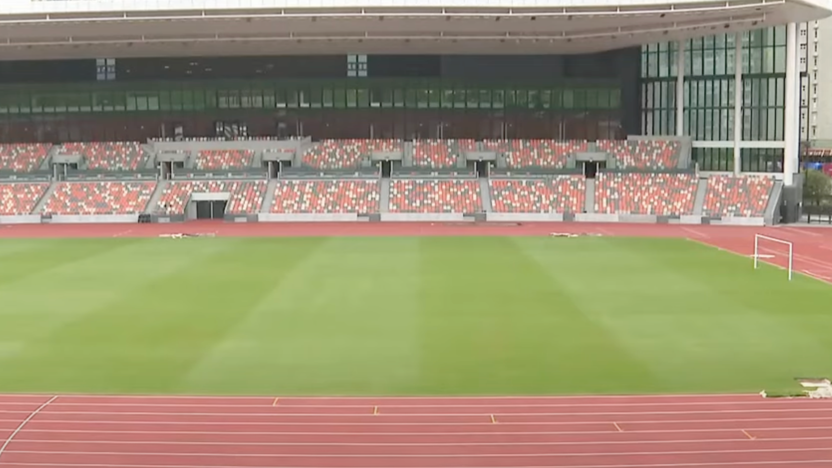 a stadium with a track and a field