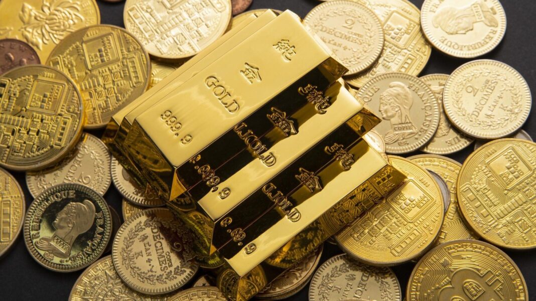 Pile of gold coins and bars